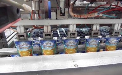 Image of packed juice products on conveyor